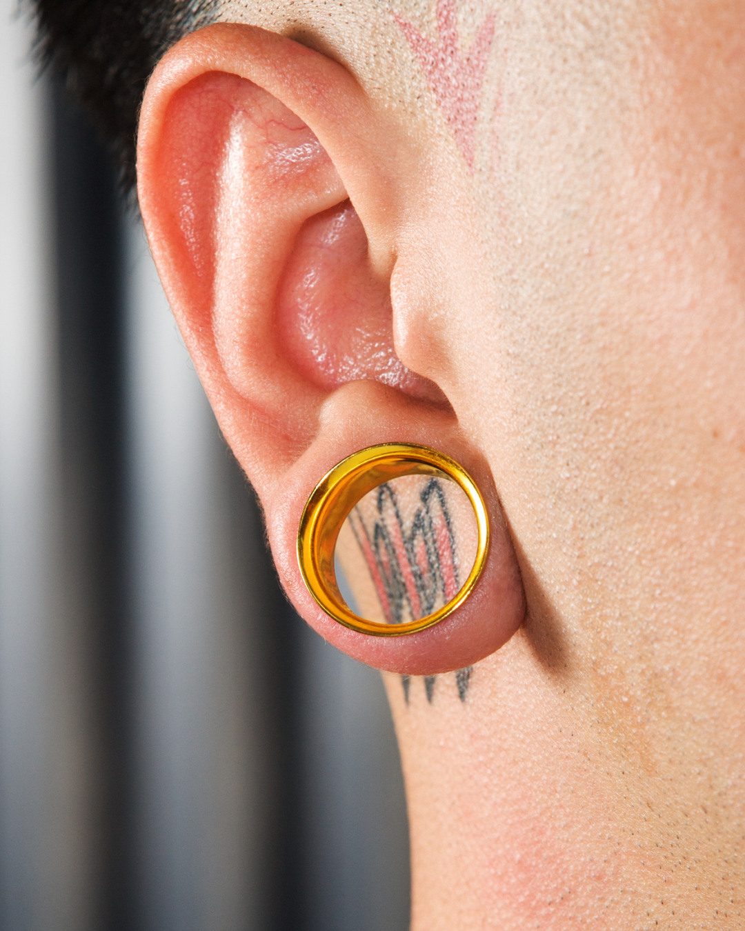 stretched earlobe stock image